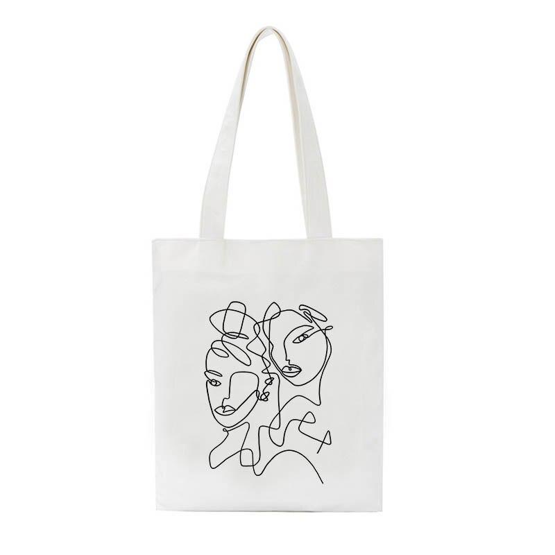 Tote bag 2025 visage abstrait